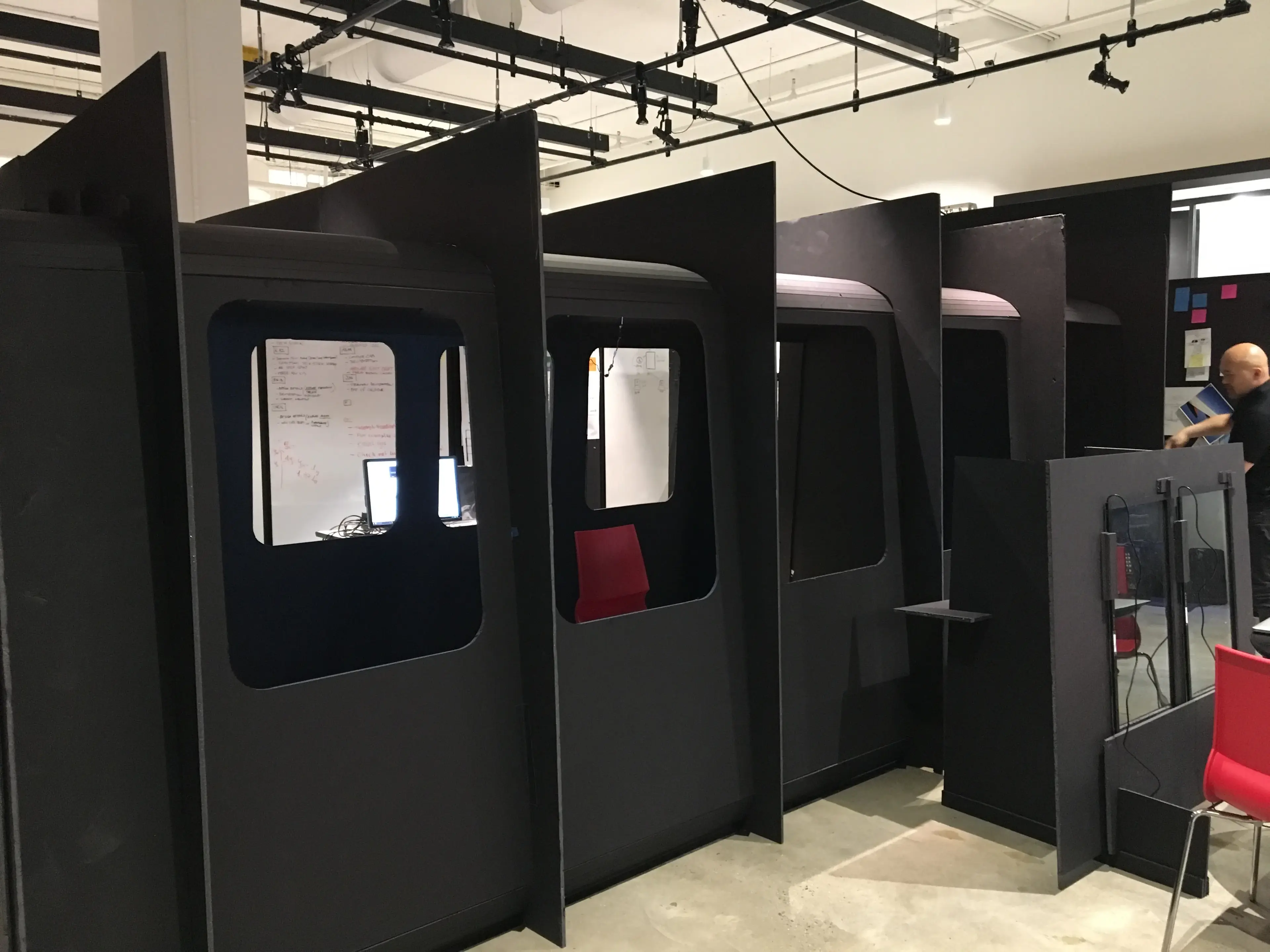 Full-scale prototype of the bus interior under construction in a fabrication shop